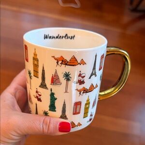 Wanderlust Mug with Gold Handle and Iconic Landmarks